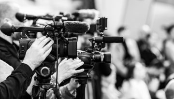 Cameras at a Press Conference, Green Energy Public Media Event