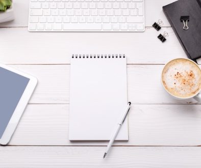 Workspace with computer and diary